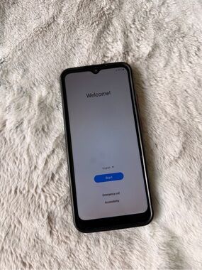 Samsung Black Smartphone with Blue Start Screen